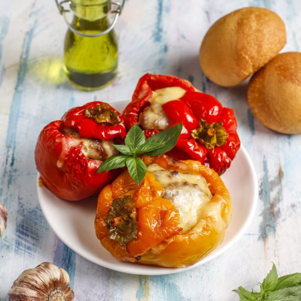 Colorful baked with cheese, stuffed peppers with minced meat.